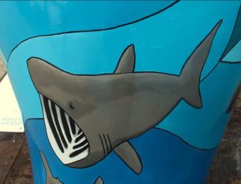 A close up of a basking shark painted on The Deep's puffin.