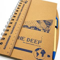 Front of the A5 recycled notebook features a picture of The Deep. Also showing the ruler and pen that accompanies the notebook.