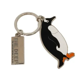 Metal keyring with black and white gentoo penguin and additional metal tag branded with The Deep